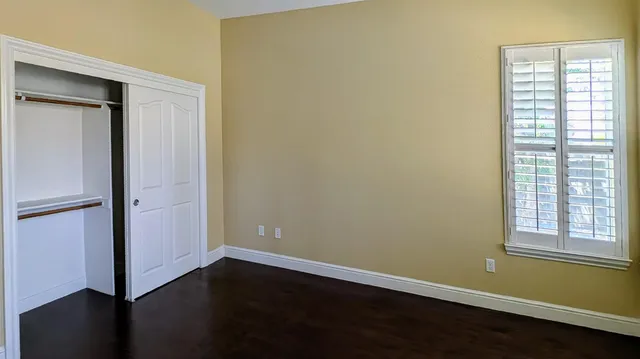 a room with cabinets and a window