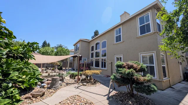 a house view with a outdoor space