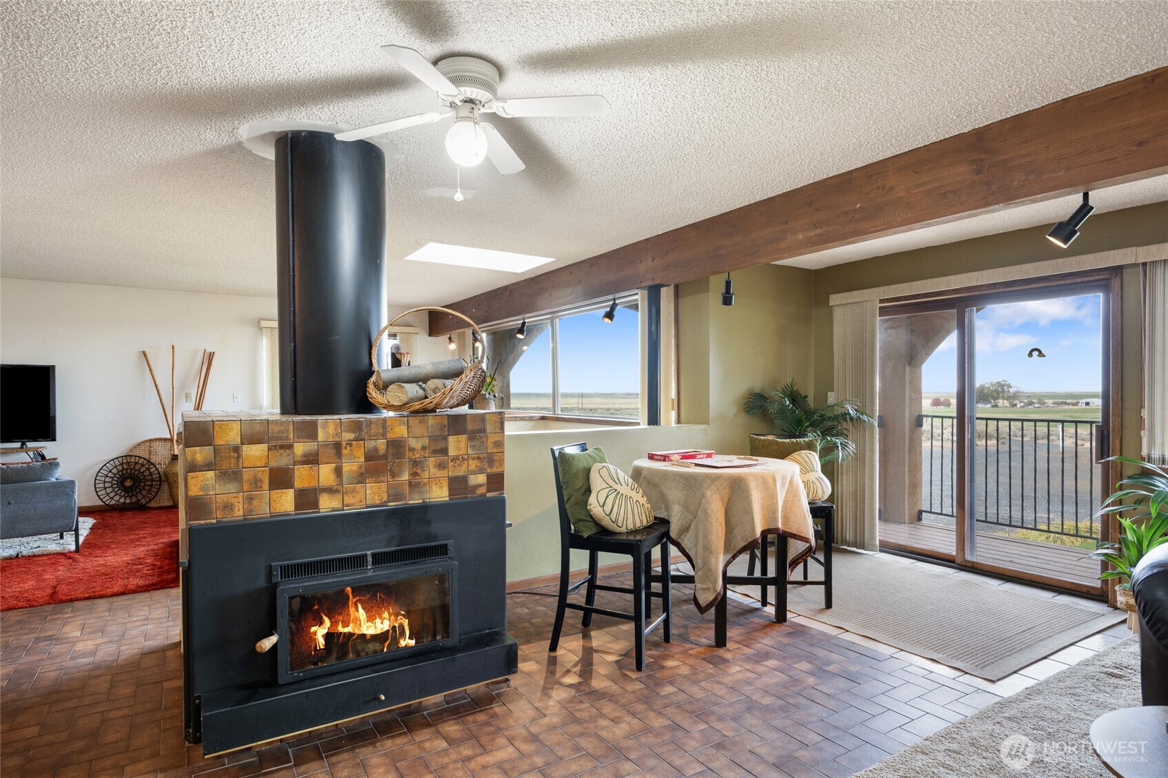 18850 Stratford Road Northeast Moses Lake, WA 98837 - Photo 12 of 40 a view of a livingroom with furniture and a fireplace