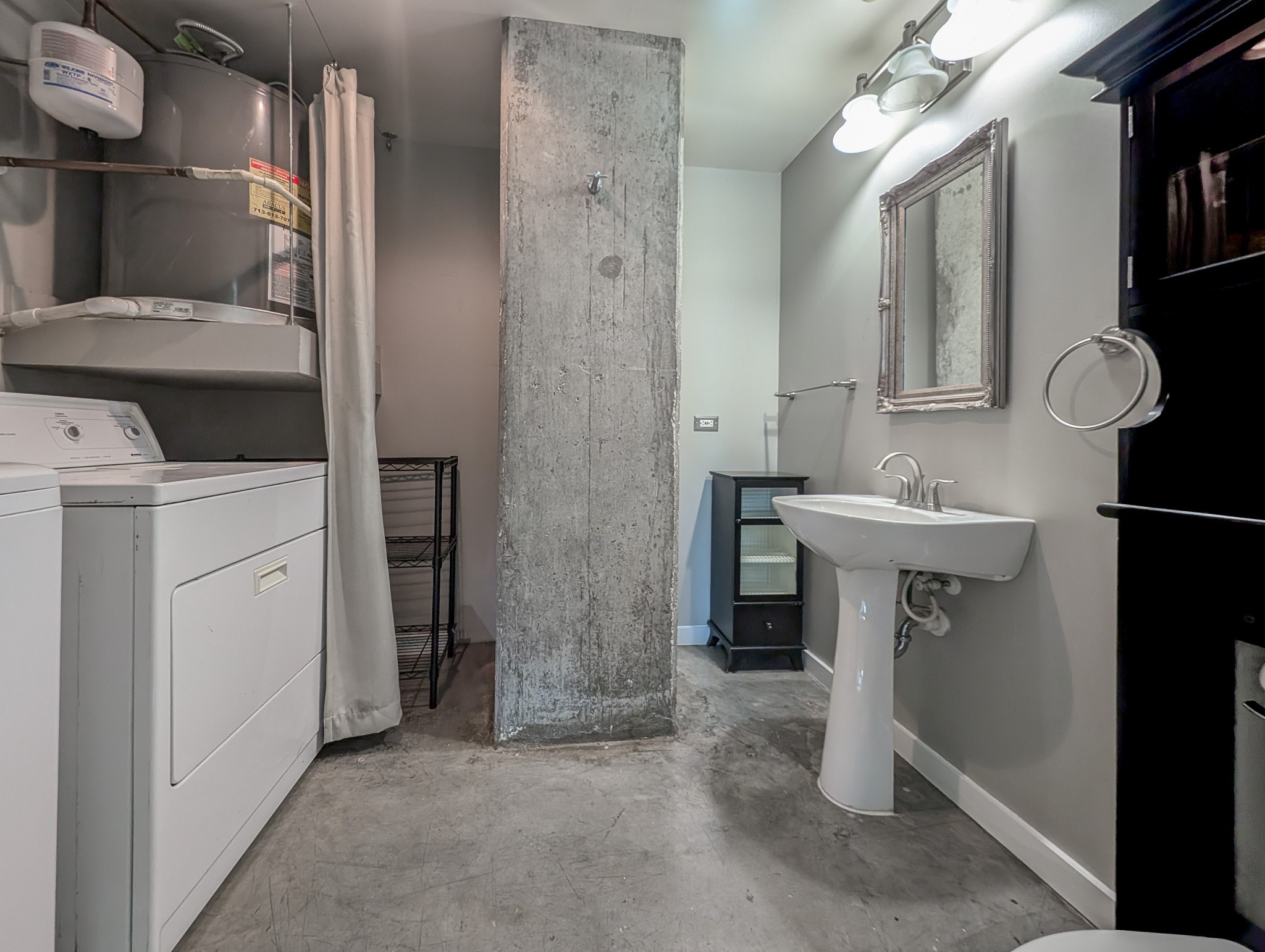 2000 Bagby Street, Unit 7417 Houston, TX 77002 - Photo 11 of 11 a bathroom with a sink and a mirror