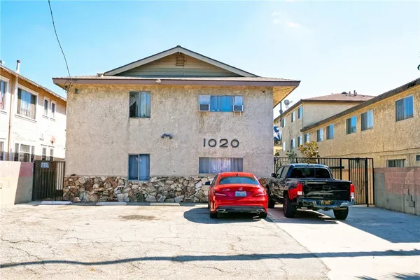 a car parked in front of a house