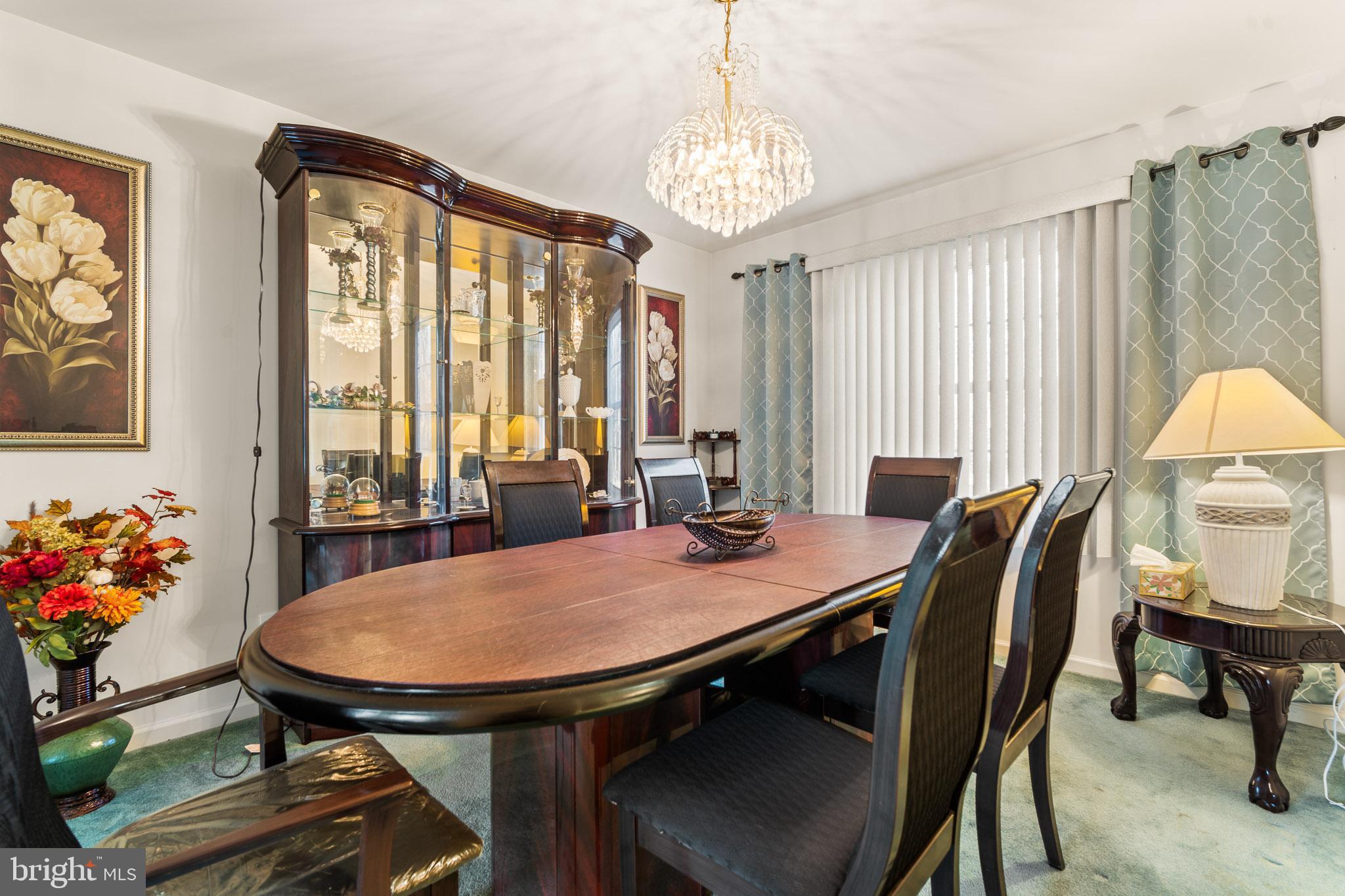 202 North New York Road Galloway Township, NJ 08205 - Photo 11 of 34 a view of a dining room with furniture and window