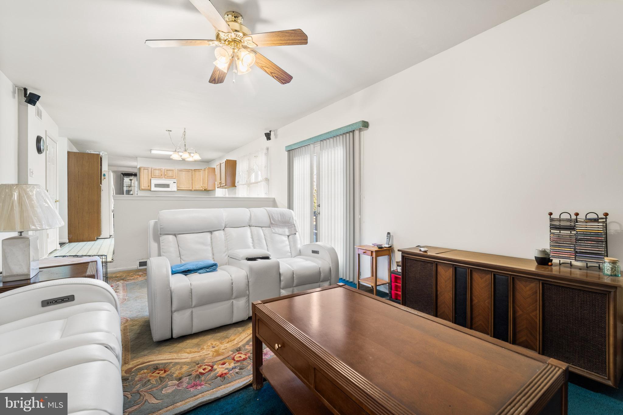 202 North New York Road Galloway Township, NJ 08205 - Photo 19 of 34 a living room with furniture and a flat screen tv