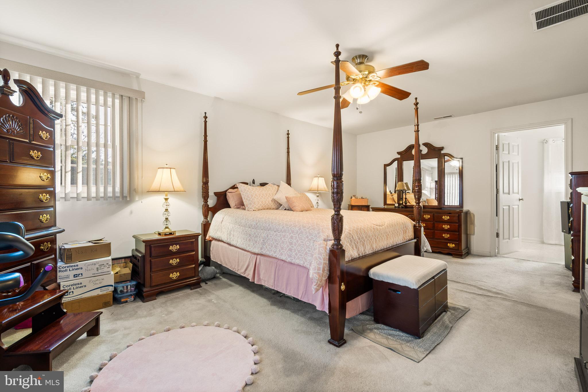 202 North New York Road Galloway Township, NJ 08205 - Photo 21 of 34 a bedroom with a bed dresser and a window