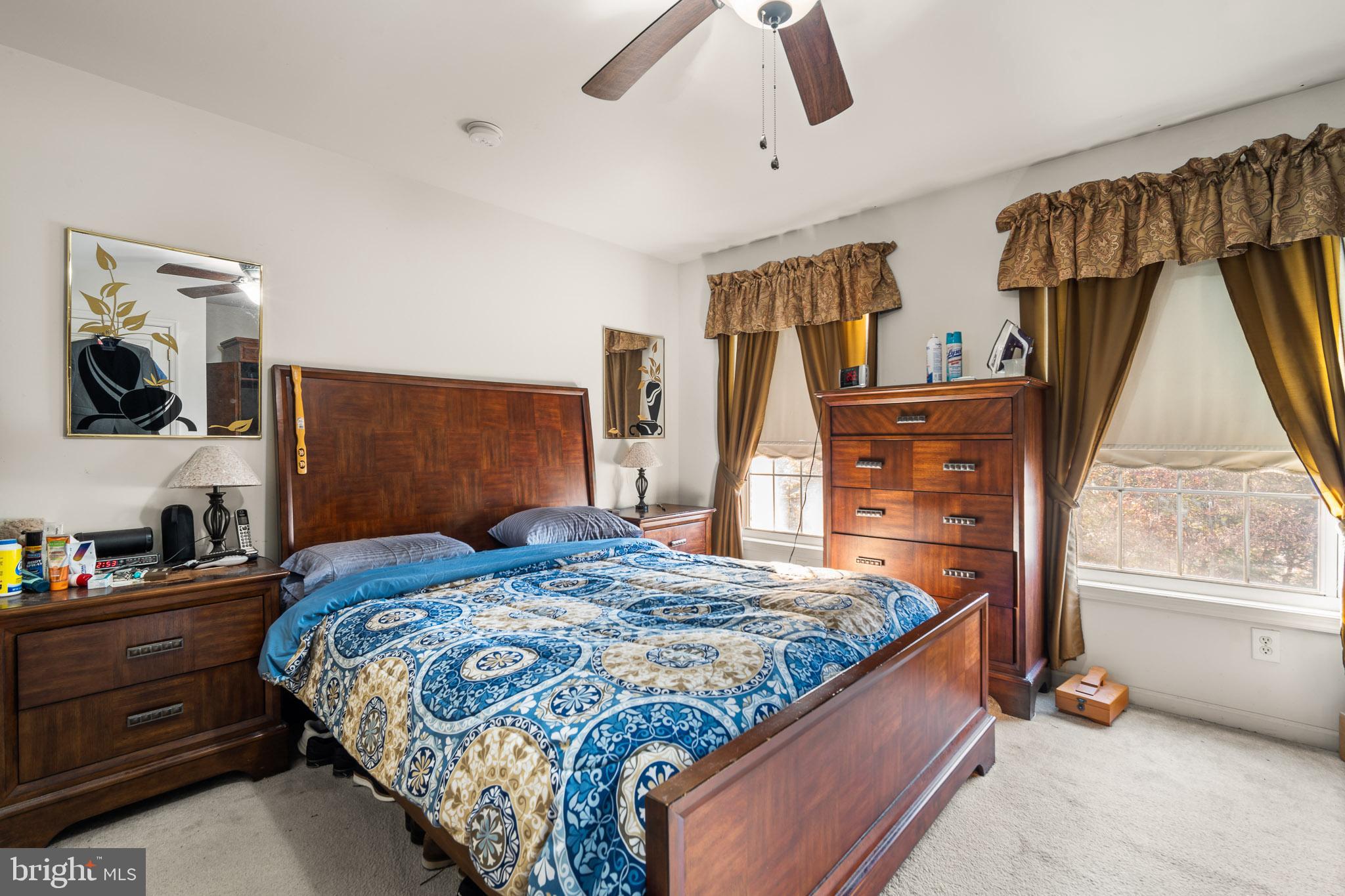 202 North New York Road Galloway Township, NJ 08205 - Photo 26 of 34 a bedroom with a bed and flat screen tv