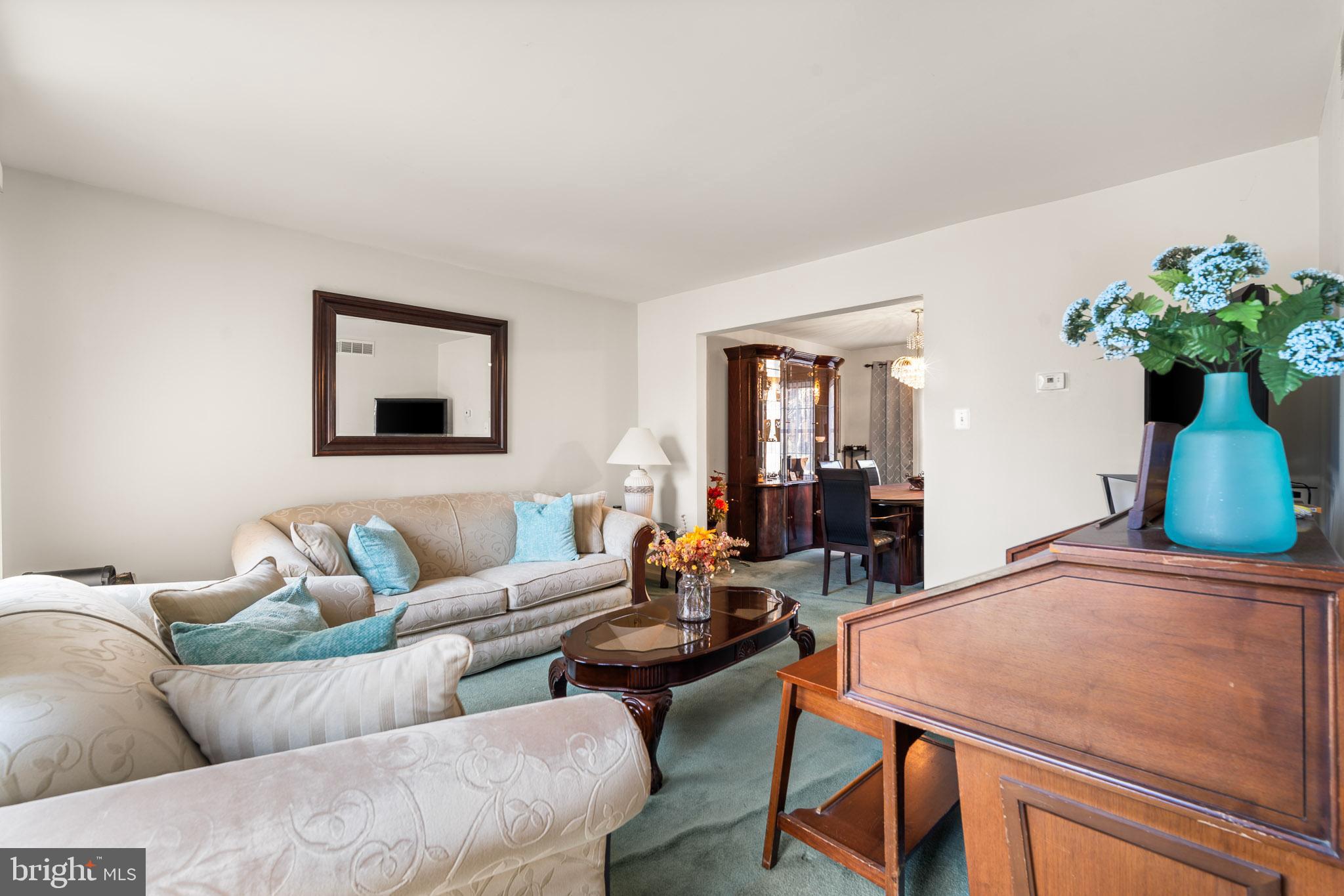 202 North New York Road Galloway Township, NJ 08205 - Photo 8 of 34 a living room with furniture and a potted plant