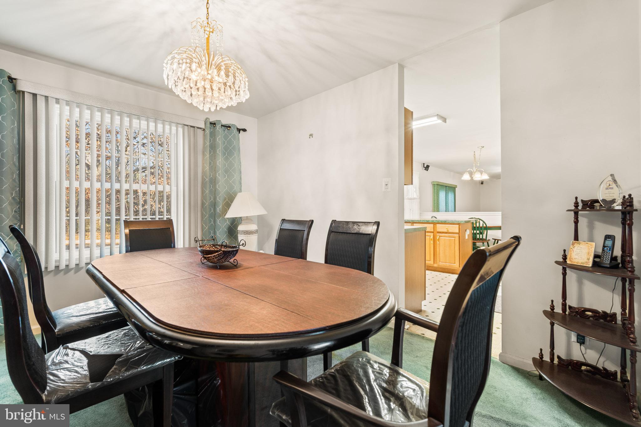 202 North New York Road Galloway Township, NJ 08205 - Photo 10 of 34 a view of a dining room with furniture window and wooden floor