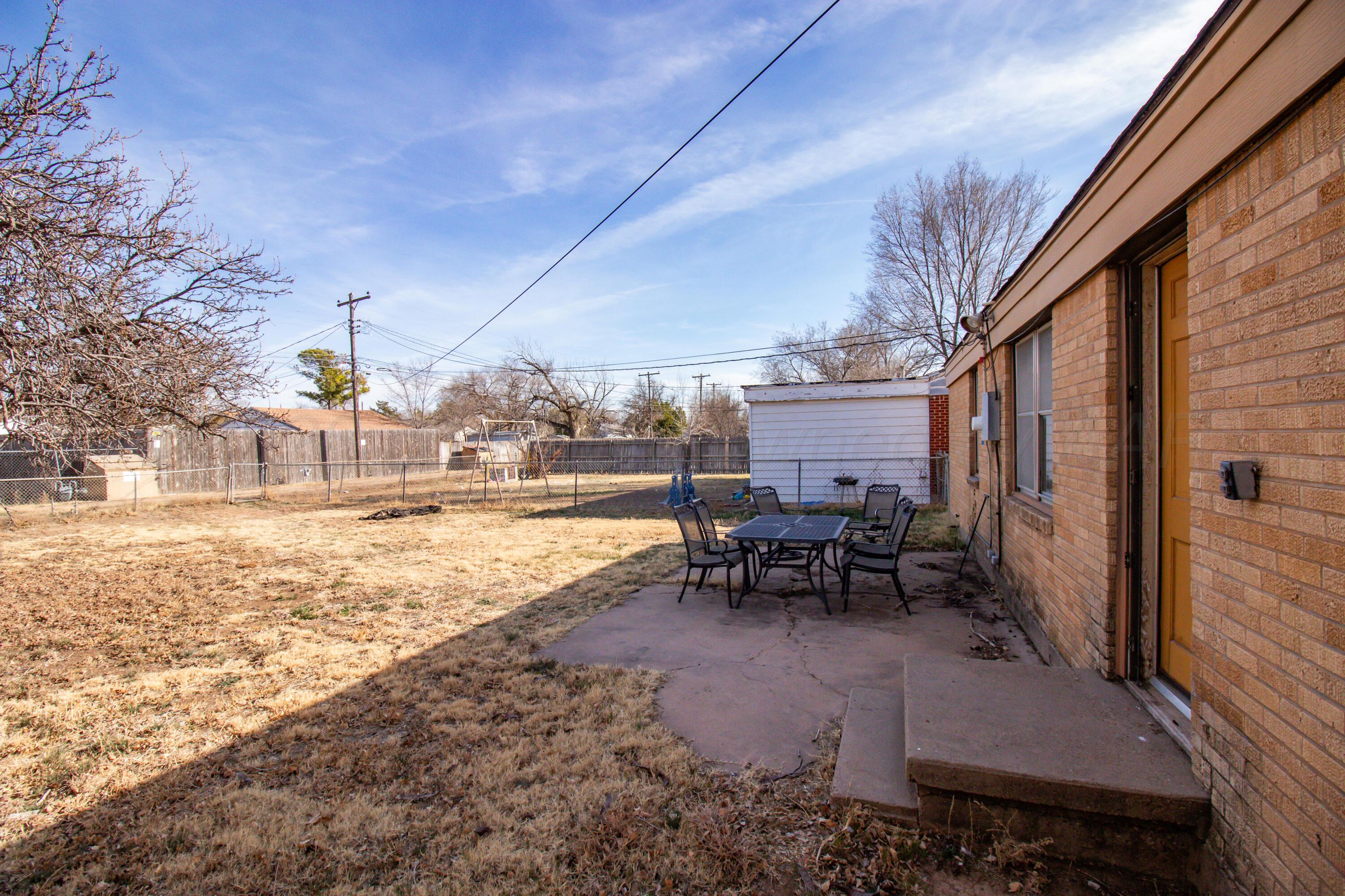 4211 South Travis Street Amarillo, TX 79110 - Photo 19 of 21 a view of a outdoor space with seating area