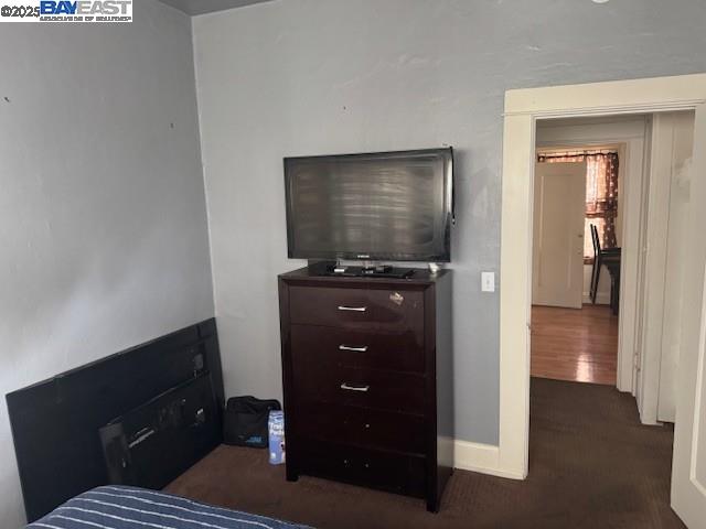 1009 Addison Street Berkeley, CA 94710 - Photo 23 of 34 a living room with furniture and a flat screen tv