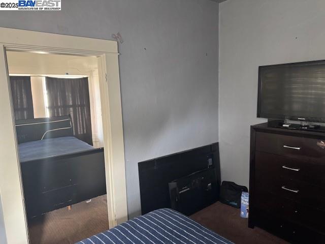 1009 Addison Street Berkeley, CA 94710 - Photo 24 of 34 a bedroom with a bed and a dresser