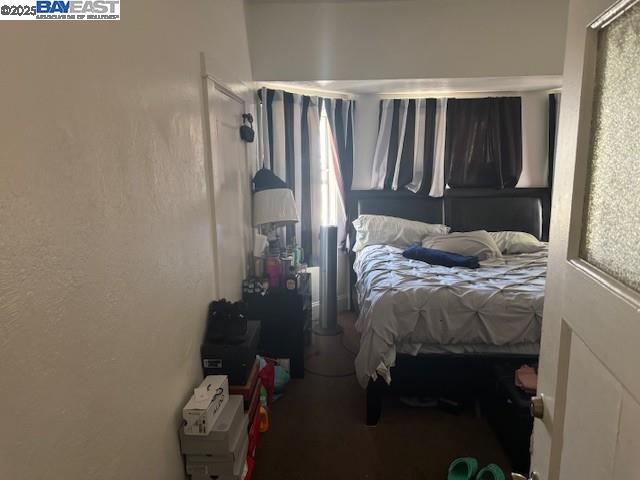 1009 Addison Street Berkeley, CA 94710 - Photo 27 of 34 a bedroom with a bed and a closet