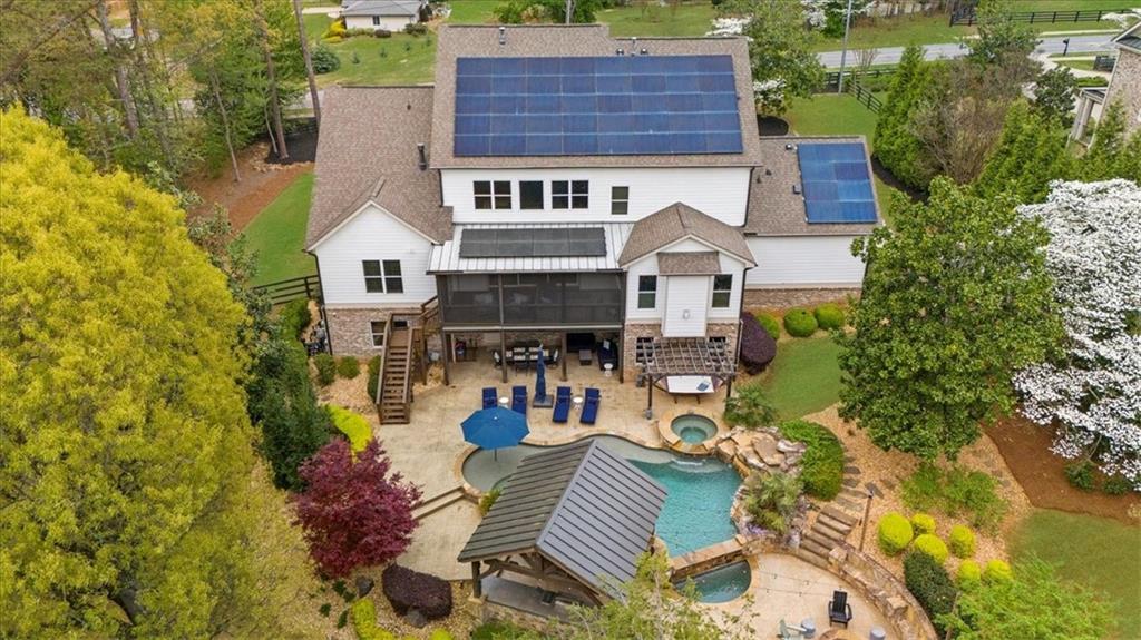 332 Chaffin Road Roswell, GA 30075 - Photo 1 of 1 aerial view of a house with swimming pool and sitting area