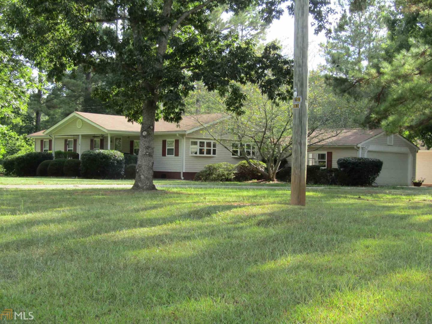 653 Johnny Cut Road Griffin, GA 30223 - Photo 1 of 1 a front view of a house with a garden