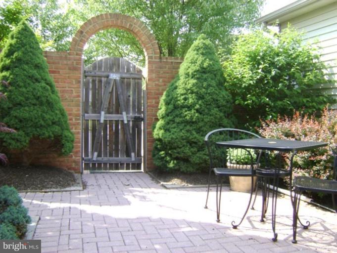 2638 Mill Race Road Frederick, MD 21701 - Photo 2 of 21 Fenced in yard with Brick wall and all Brick Patio