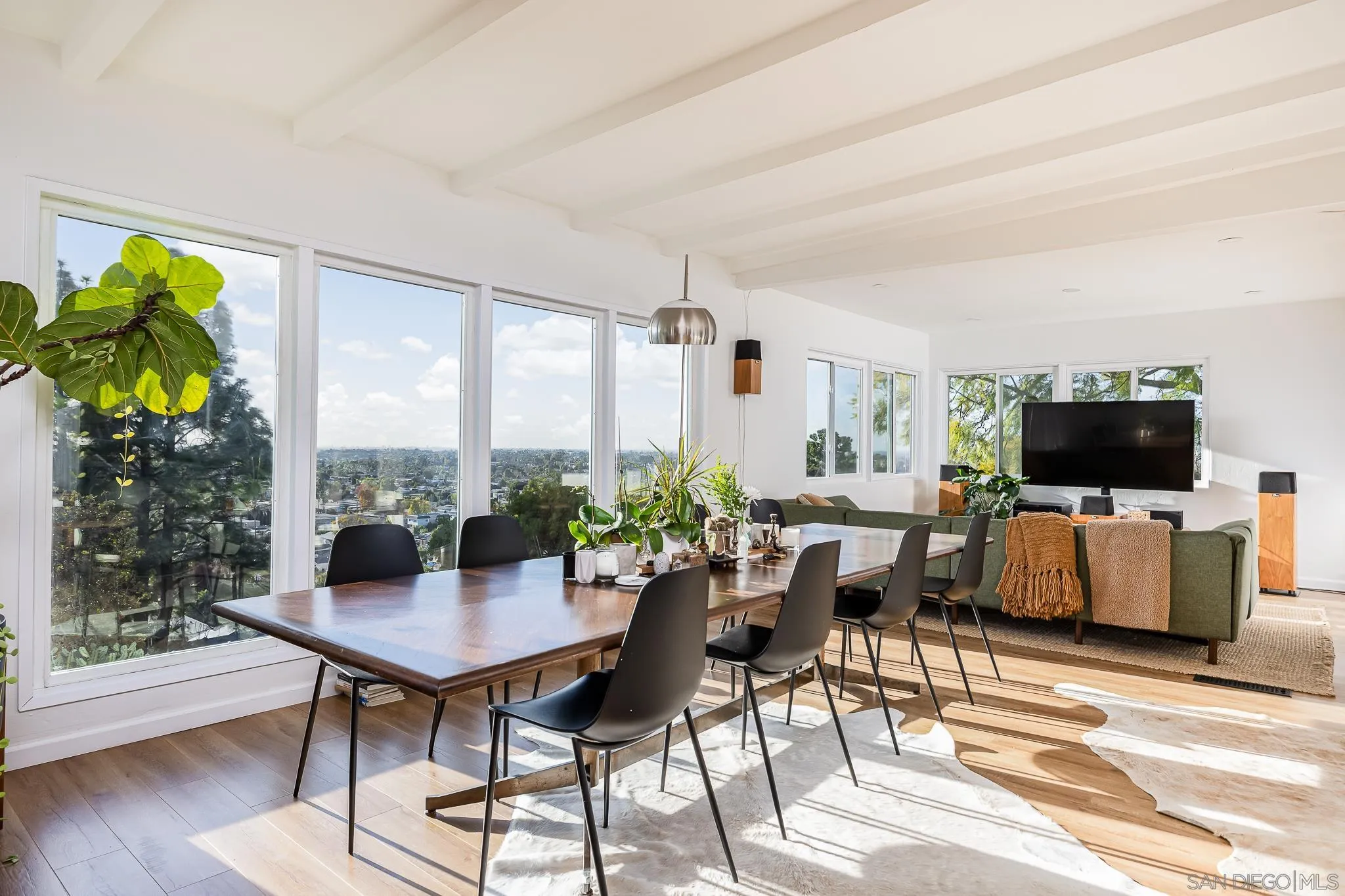 4344 Avon Drive La Mesa, CA 91941 - Photo 11 of 50 a living room with furniture and a flat screen tv