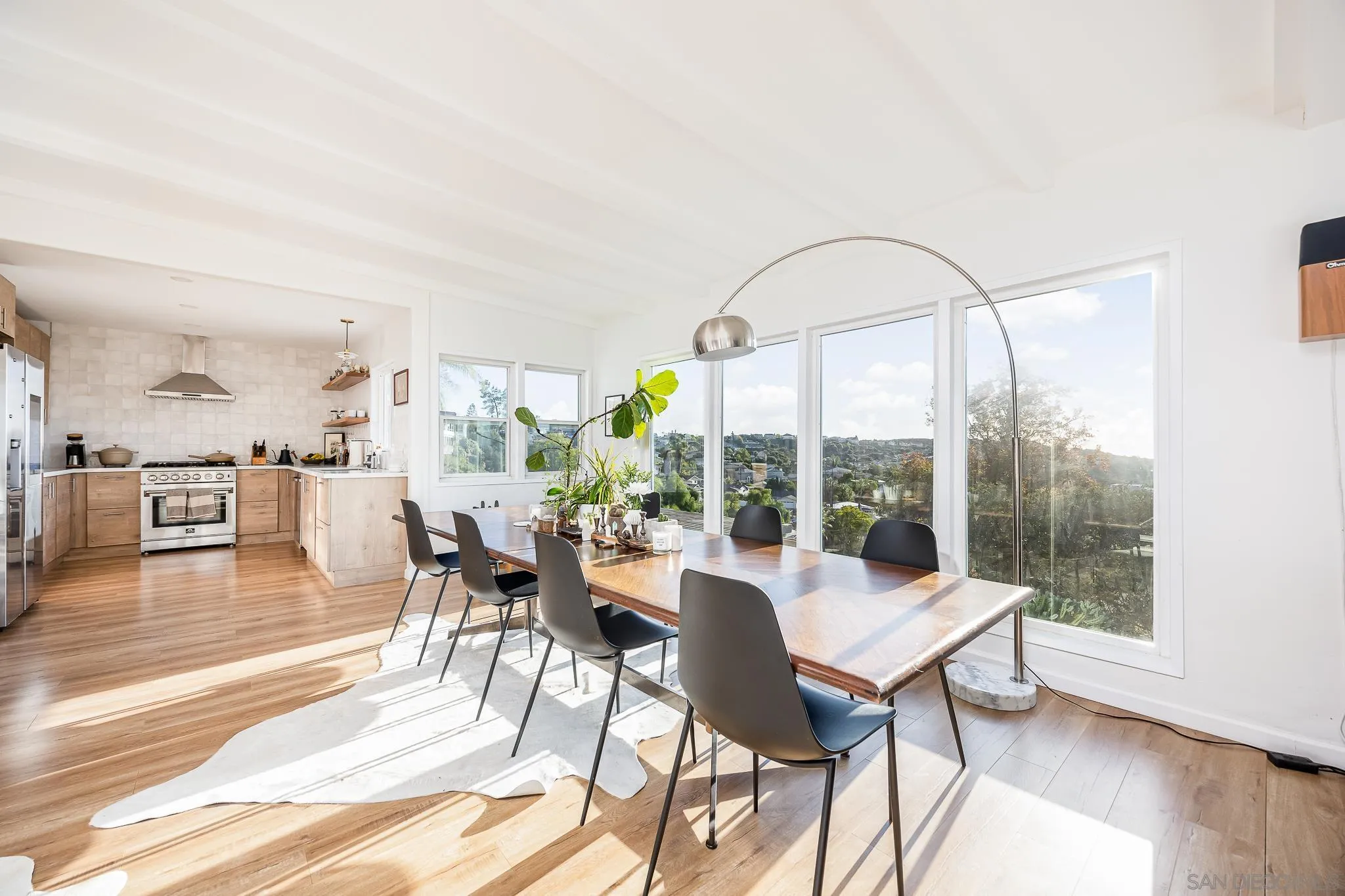 4344 Avon Drive La Mesa, CA 91941 - Photo 13 of 50 a view of a dining room with furniture window and wooden floor