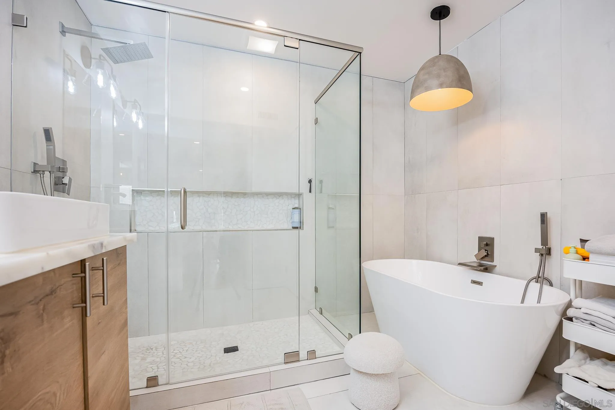 4344 Avon Drive La Mesa, CA 91941 - Photo 23 of 50 a bathroom with a sink a toilet and shower