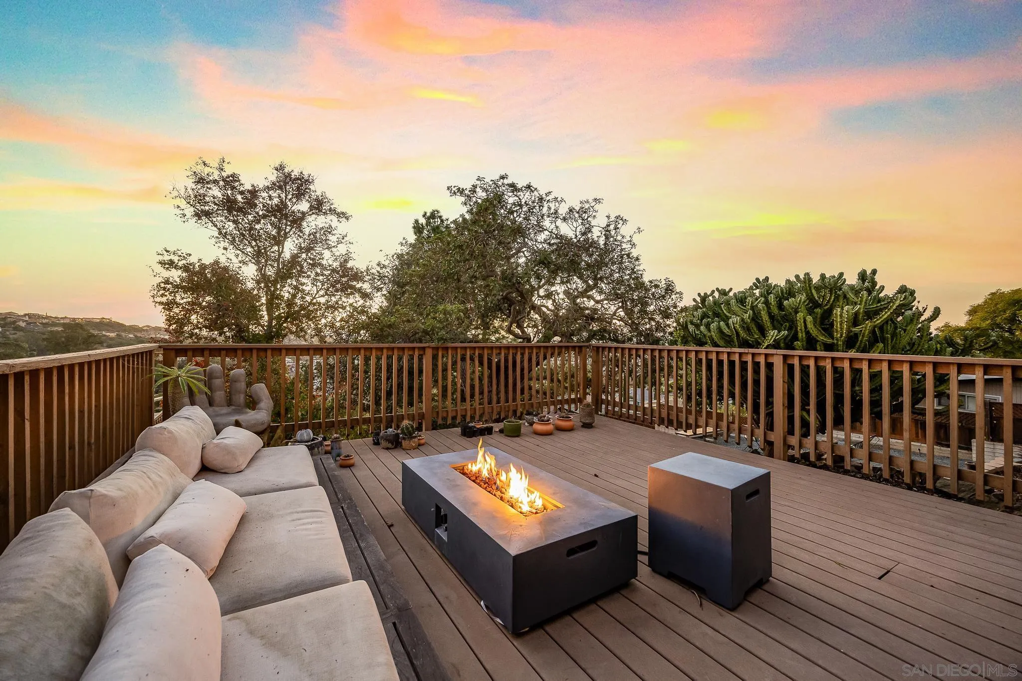 4344 Avon Drive La Mesa, CA 91941 - Photo 31 of 50 a balcony with wooden floor table and chairs