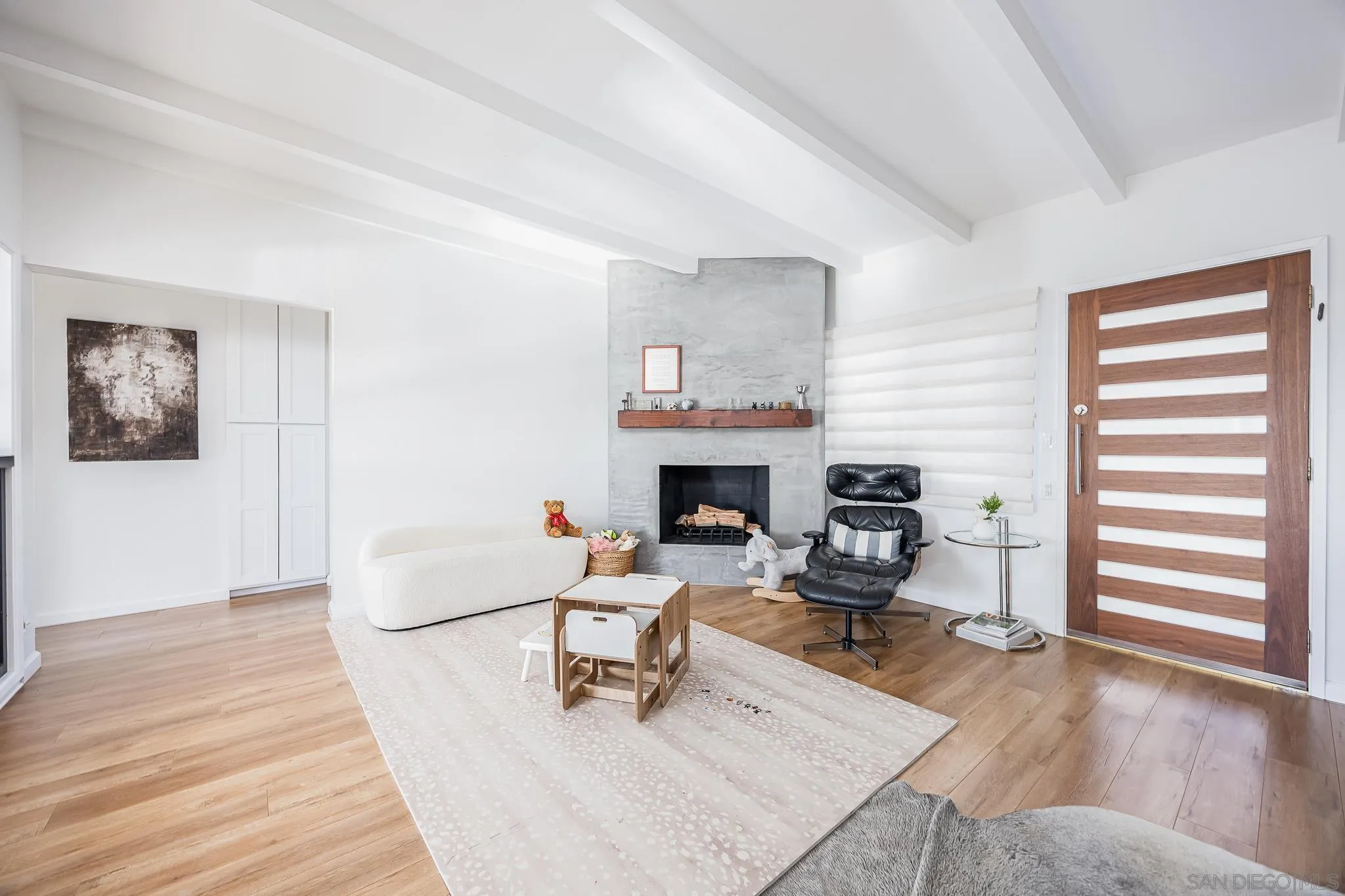 4344 Avon Drive La Mesa, CA 91941 - Photo 5 of 50 a living room with furniture a fireplace and wooden floor