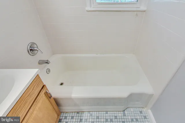 a bathroom with a bathtub