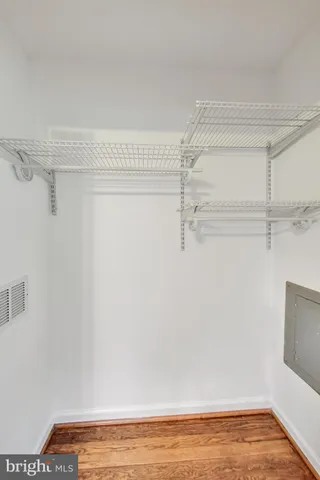 a view of a room with racks on the wall