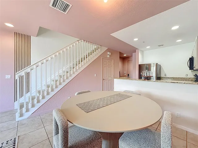 a bedroom with bed and window
