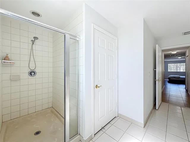 a view of a hallway with staircase