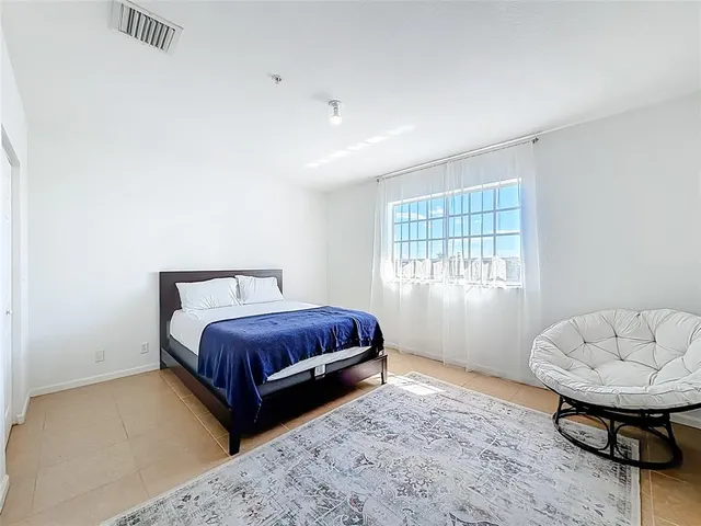 a utility room with sink dryer and washer