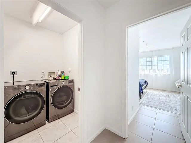 a view of storage and utility room with gym equipment