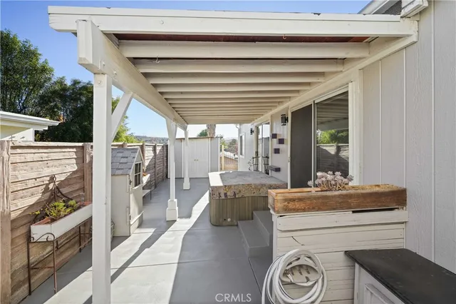 a lobby with furniture and a gate