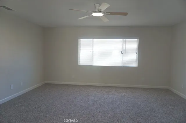 a white bath tub sitting next to a white sink