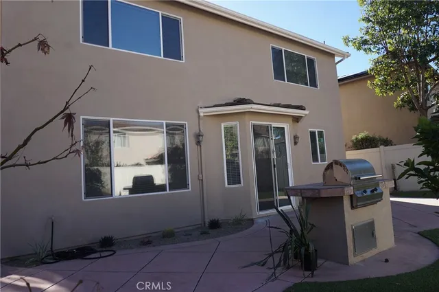 a house view with a outdoor space