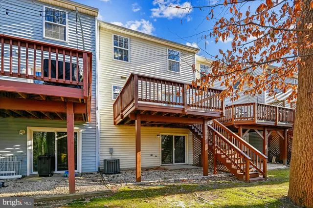 a view of a wooden roof deck