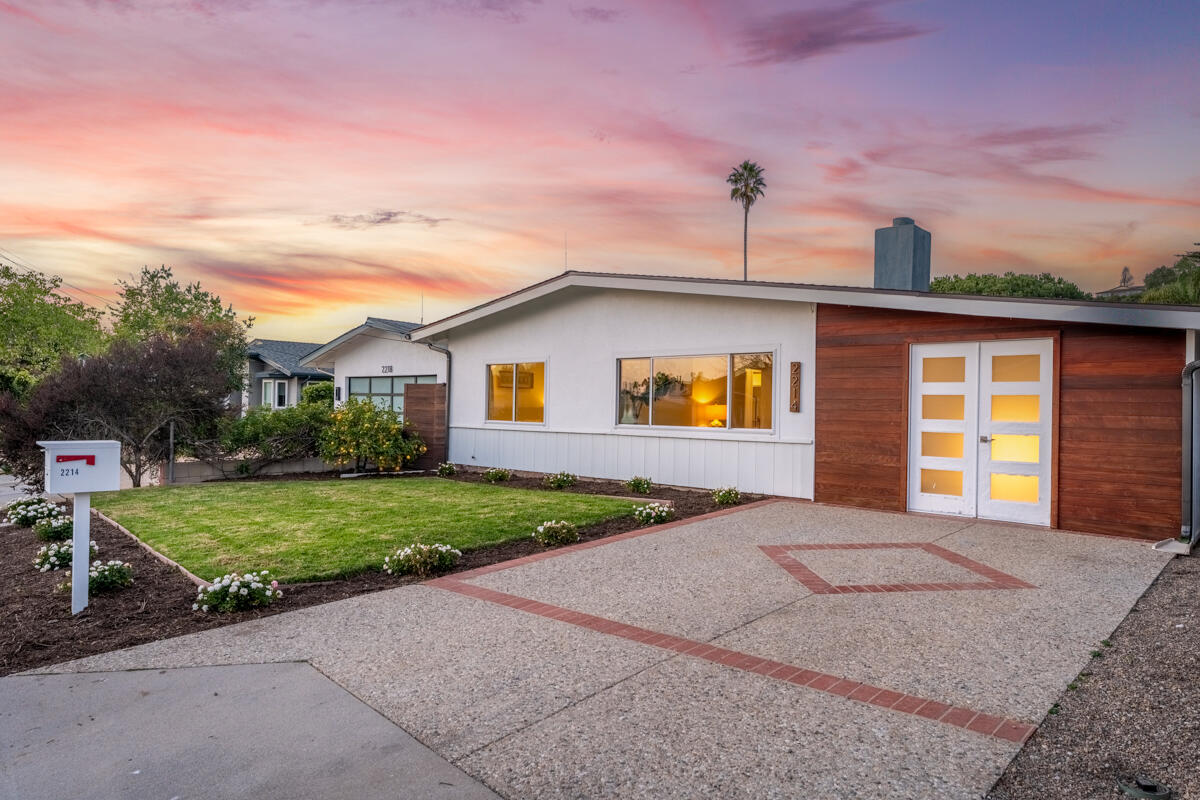 2214 Channing Way Santa Barbara, CA 93109 - Photo 36 of 44 a front view of a house with a yard and garage