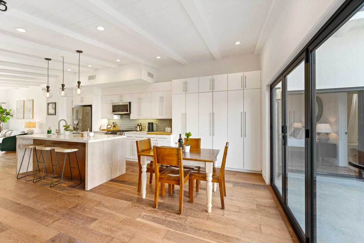 2214 Channing Way Santa Barbara, CA 93109 - Photo 10 of 44 a large kitchen with cabinets table and chairs