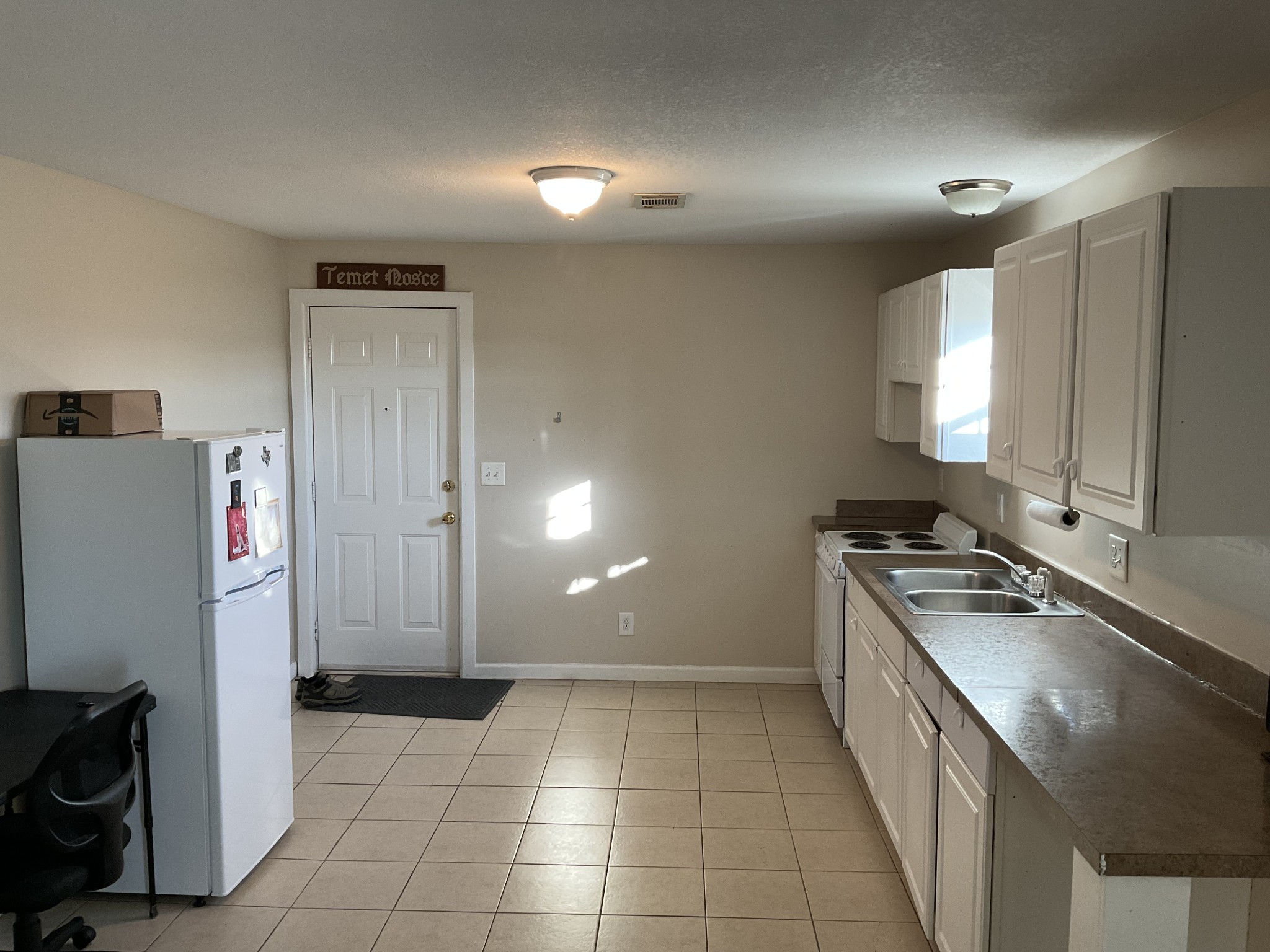 811 East 17th Avenue Springfield, TN 37172 - Photo 8 of 20 a kitchen with a sink a stove and a refrigerator
