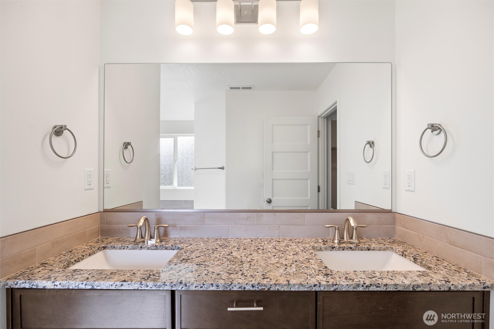 1507 South 5th Street Dayton, WA 99328 - Photo 27 of 35 a bathroom with a granite countertop sink and a mirror
