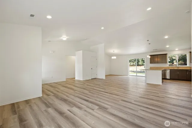 a view of kitchen and kitchen with a sink