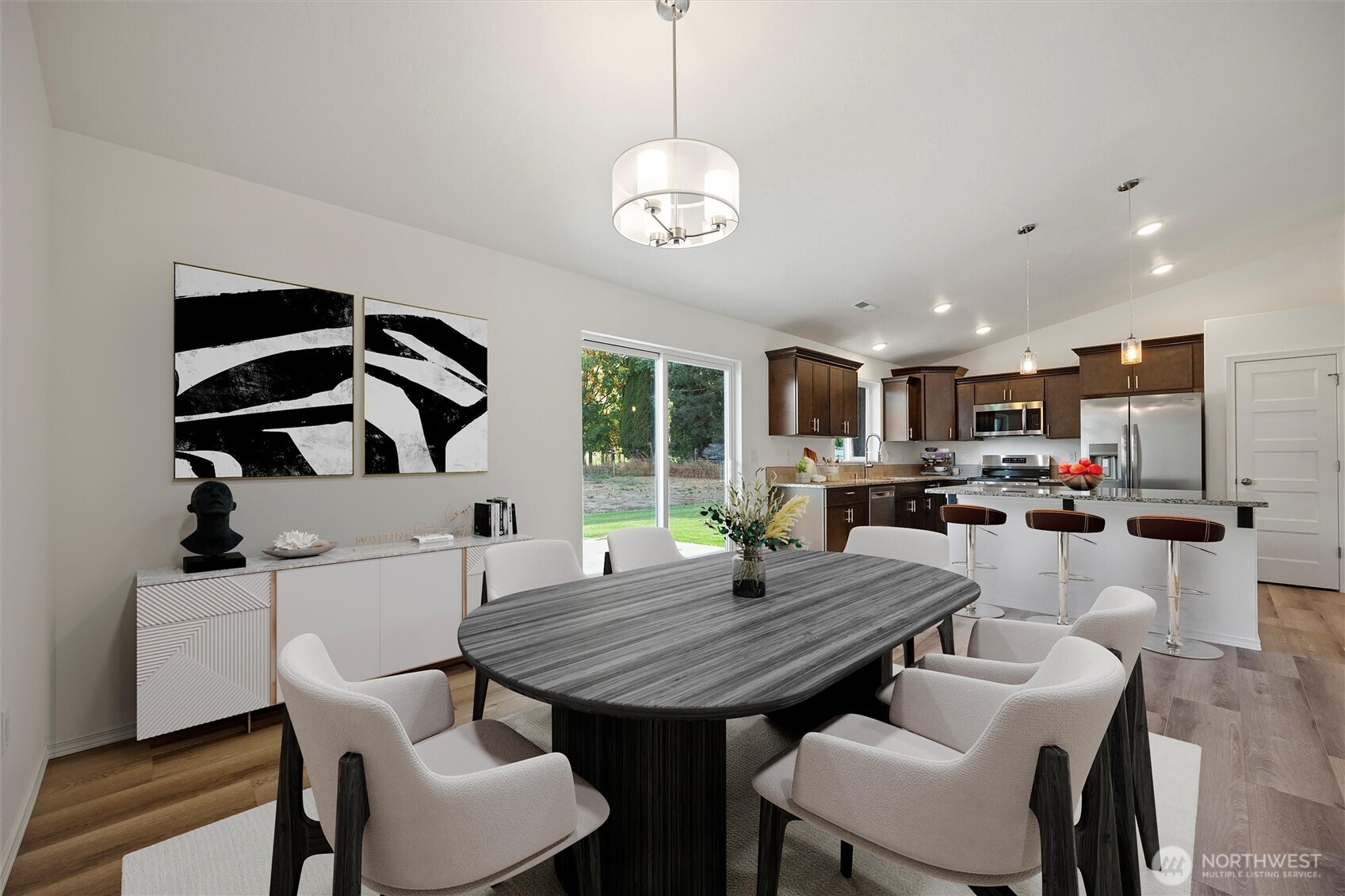 1507 South 5th Street Dayton, WA 99328 - Photo 9 of 35 a view of a dining room with furniture and wooden floor