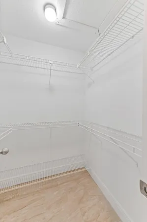 a view of a room with racks on the wall