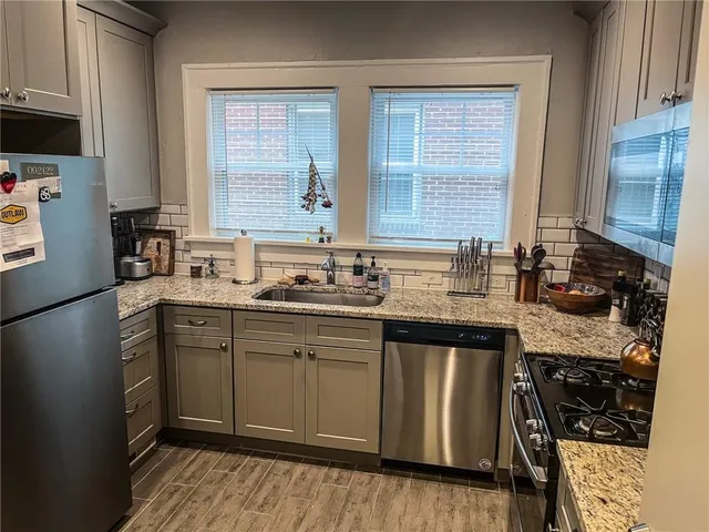a bathroom with a toilet and a sink