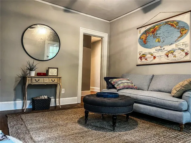 a bedroom with furniture fireplace and a window