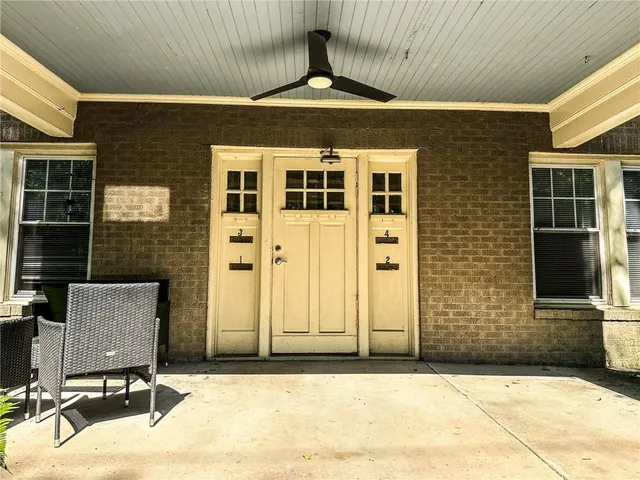 a front view of a house with a outdoor space