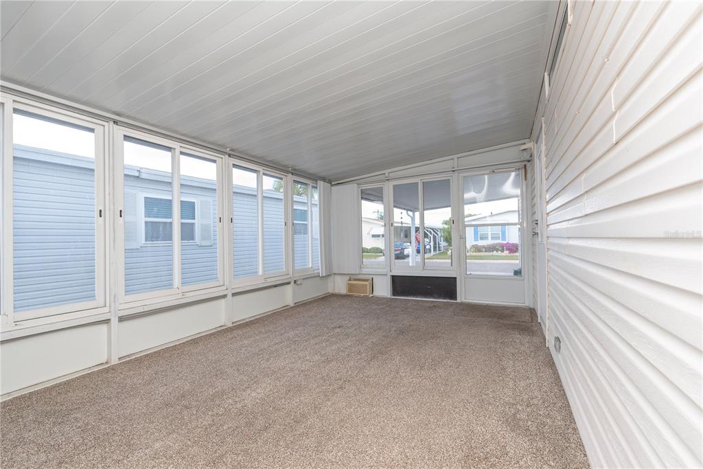 1001 Starkey Road, Unit 767 Largo, FL 33771 - Photo 19 of 41 a view of an empty room with a window