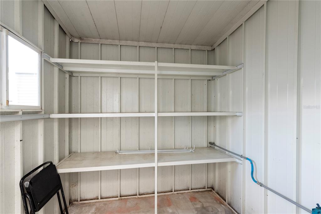 1001 Starkey Road, Unit 767 Largo, FL 33771 - Photo 20 of 41 a living room with a furniture and a window