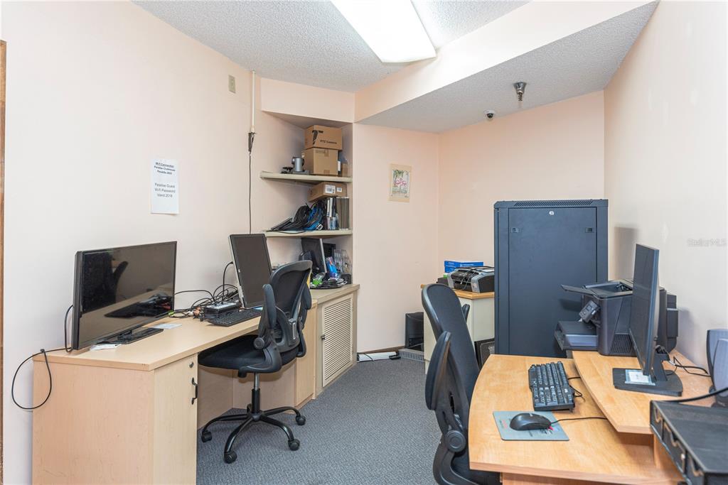 1001 Starkey Road, Unit 767 Largo, FL 33771 - Photo 30 of 41 a view of workspace with workspace and mirror