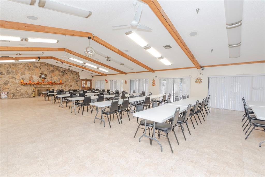 1001 Starkey Road, Unit 767 Largo, FL 33771 - Photo 33 of 41 a dining hall with lots of tall buildings