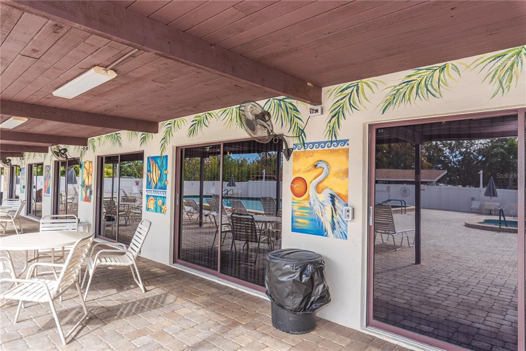1001 Starkey Road, Unit 767 Largo, FL 33771 - Photo 35 of 41 a view of an outdoor space with a flat screen tv