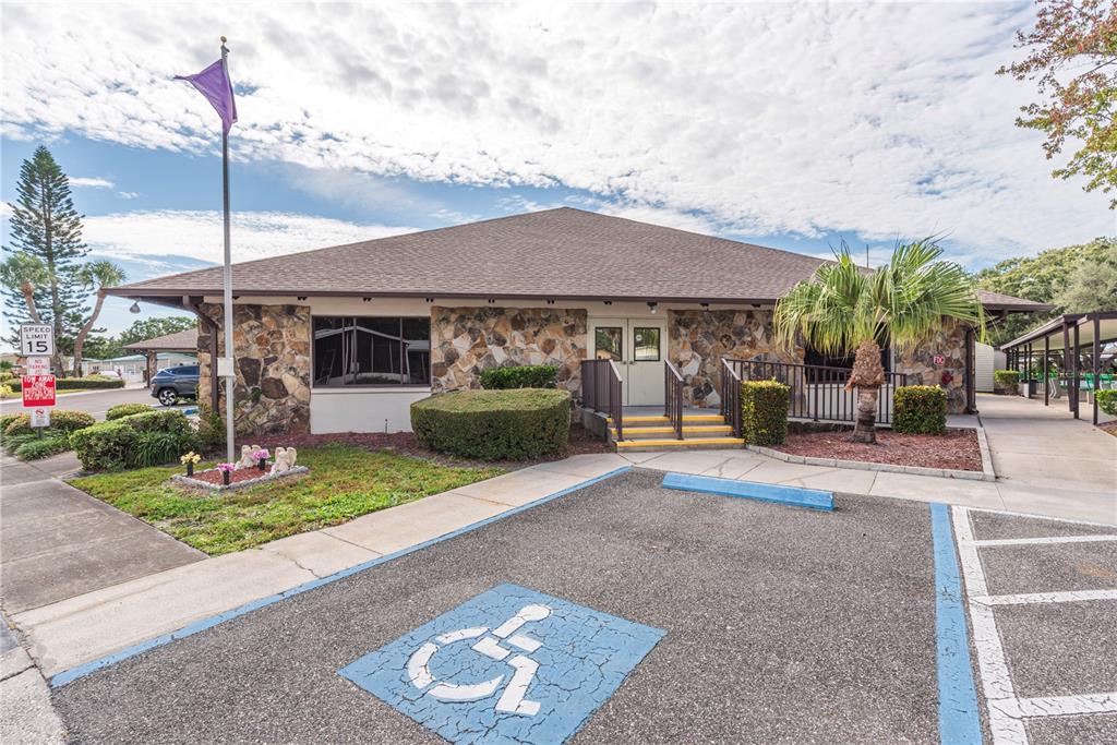 1001 Starkey Road, Unit 767 Largo, FL 33771 - Photo 38 of 41 a front view of a house with garden