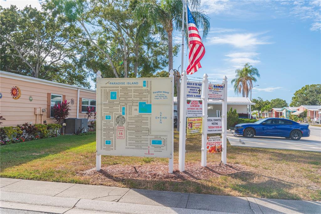 1001 Starkey Road, Unit 767 Largo, FL 33771 - Photo 41 of 41 a street sign on a side of building